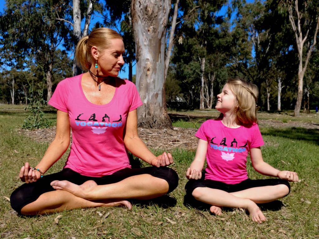 Tanya Hermann and Daughter Mila Performing Yoga